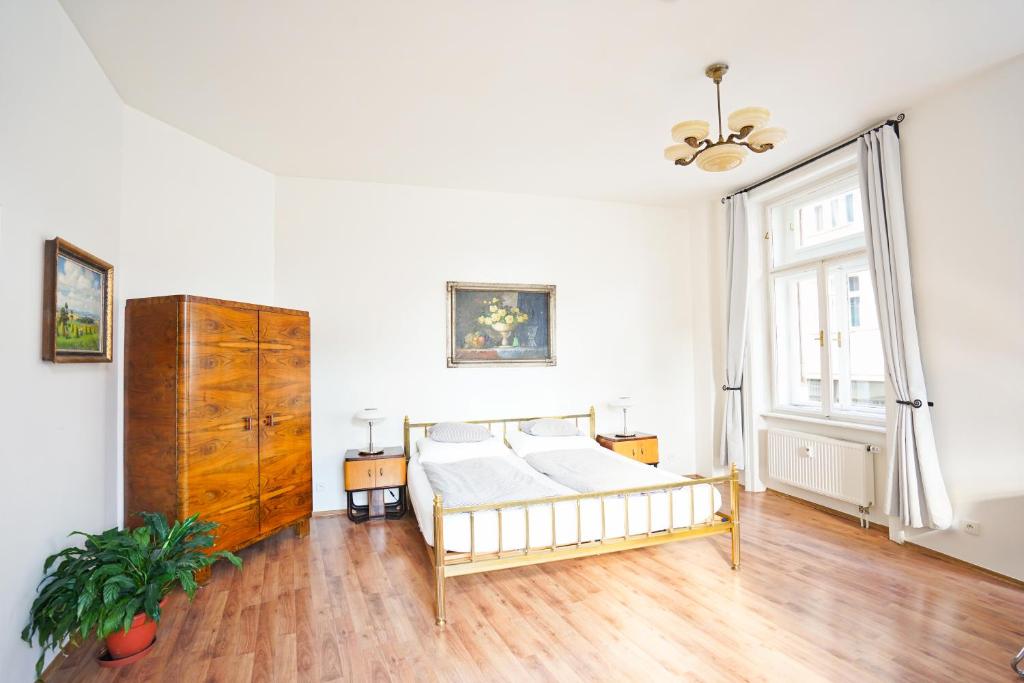 Postel nebo postele na pokoji v ubytování Jacob Brno