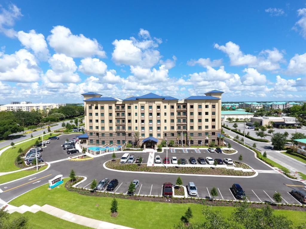 an aerial view of a hotel with a parking lot at Staybridge Suites Orlando at SeaWorld, an IHG Hotel in Orlando