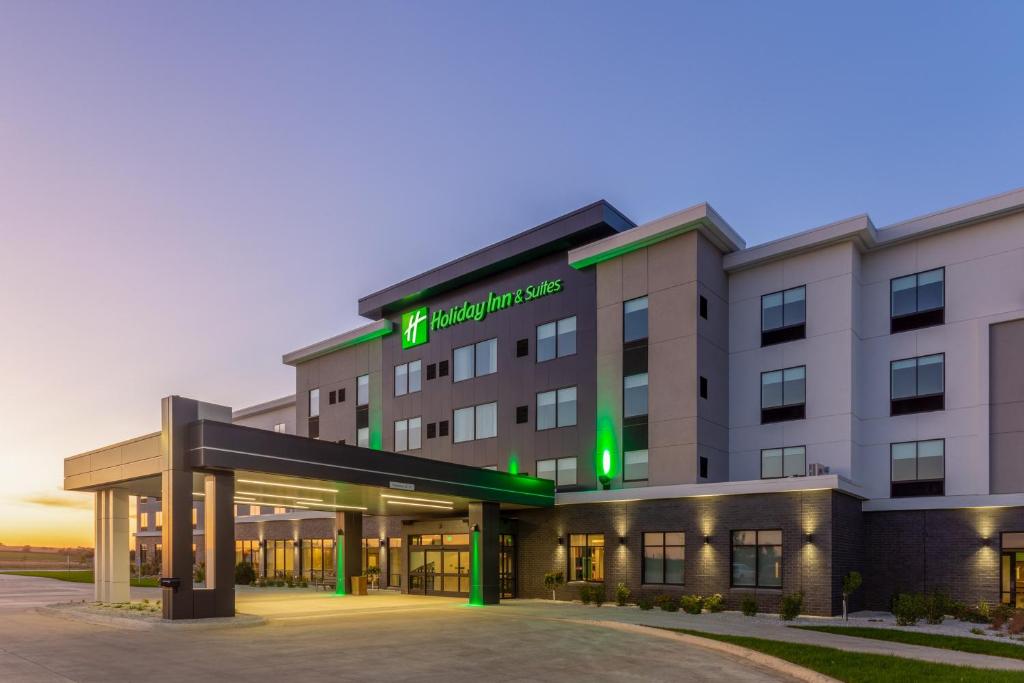 a rendering of the front of a hotel building at Holiday Inn & Suites Cedar Falls-Waterloo Event Ctr, an IHG Hotel in Cedar Falls