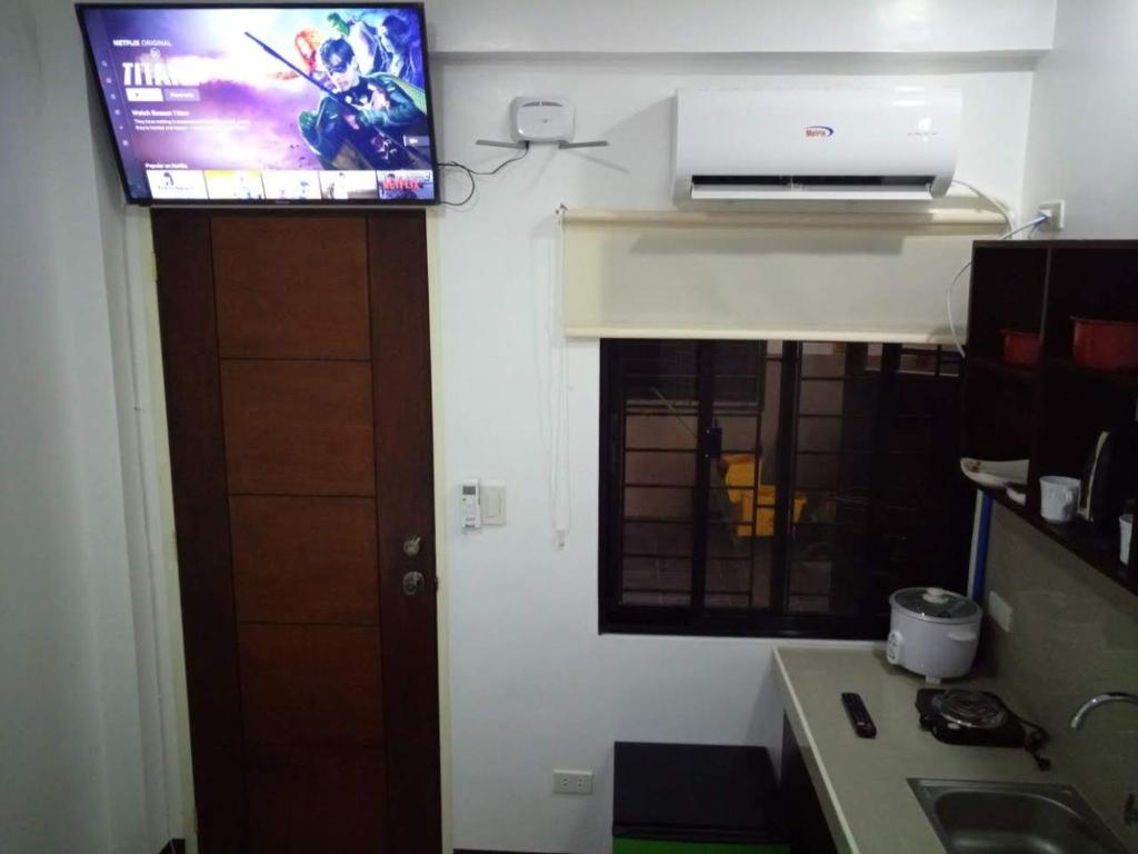 Kuchyň nebo kuchyňský kout v ubytování Clark-Pad Inn, Angeles City