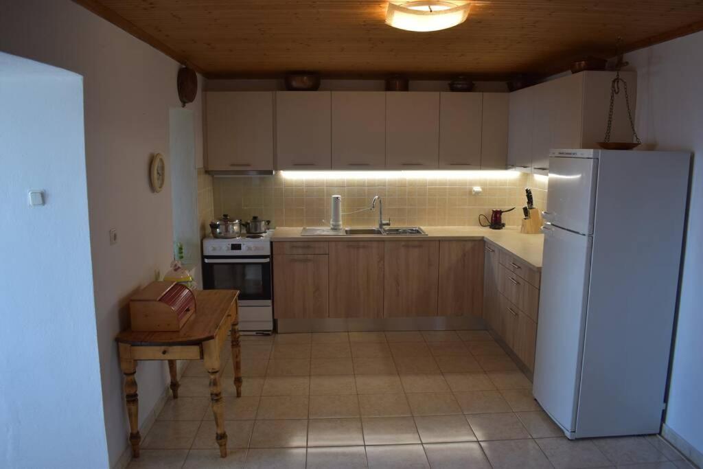 Kuchyň nebo kuchyňský kout v ubytování Afissos View