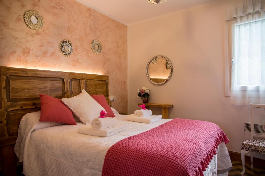 Voodi või voodid majutusasutuse Casa Lizarrosta en Nacadero del Urederra toas