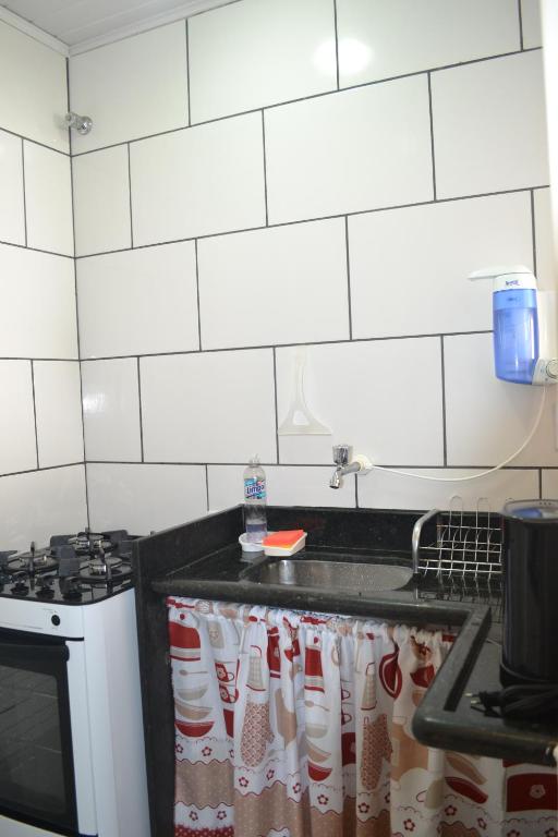  Casa com garagem e churrasqueira a 5 minutos da Praia Grande