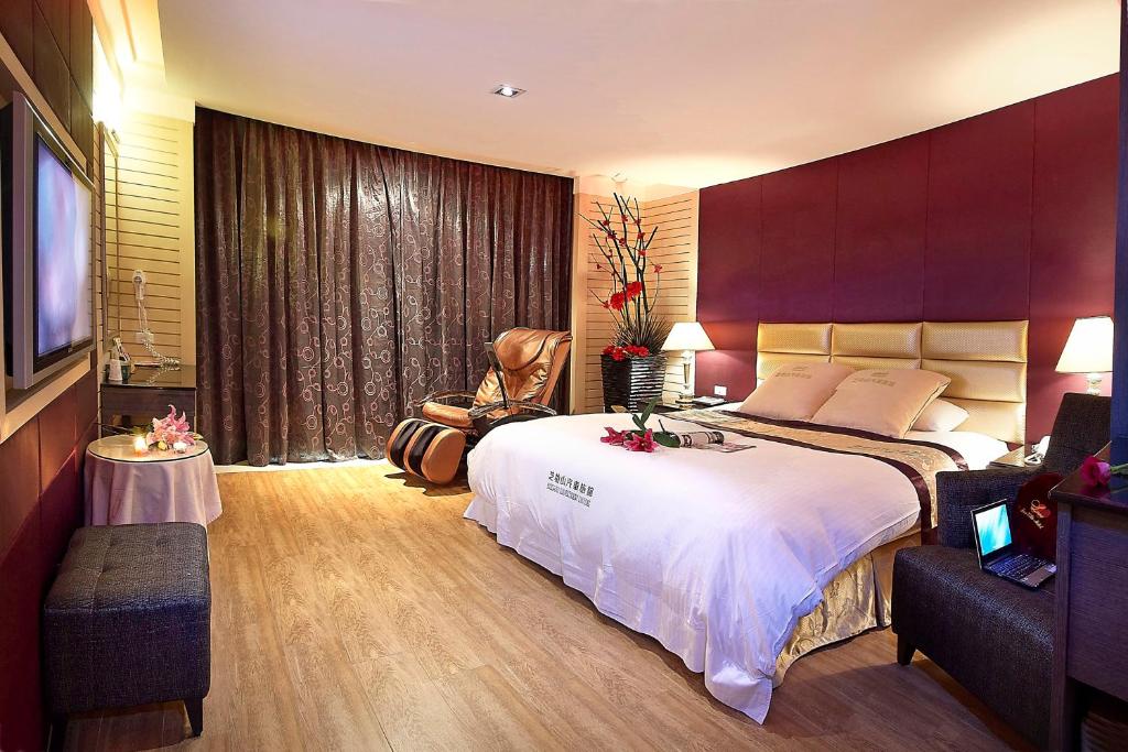 Postel nebo postele na pokoji v ubytování Zhi Baishan Motel