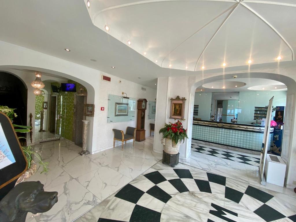 TV a/nebo společenská místnost v ubytování Grand Hotel Michelacci