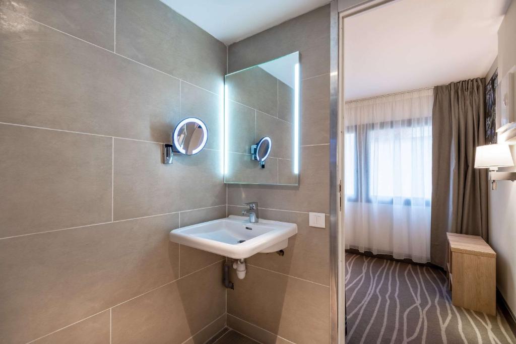 Koupelna v ubytování Quality Hotel Toulouse Centre