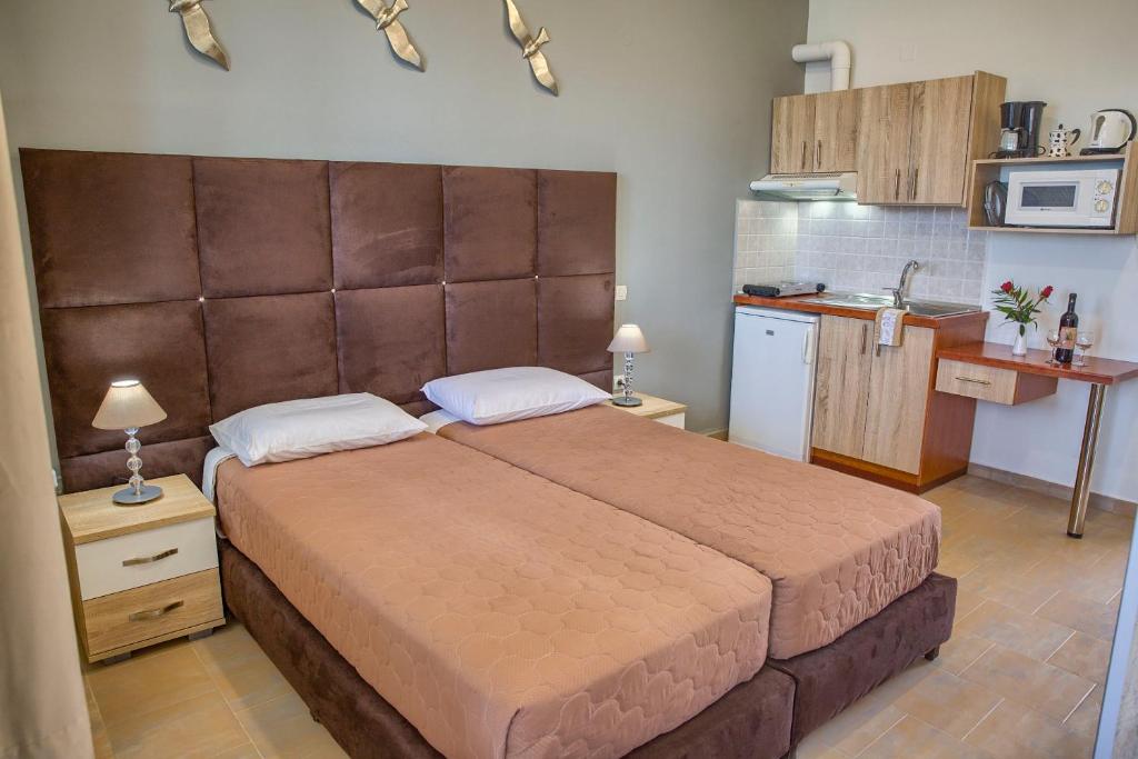 Kuchyň nebo kuchyňský kout v ubytování Haraki Sand Beach