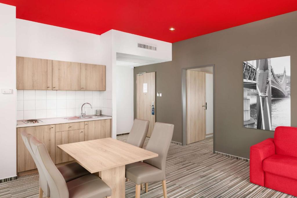 A kitchen or kitchenette at Park Inn By Radisson Budapest