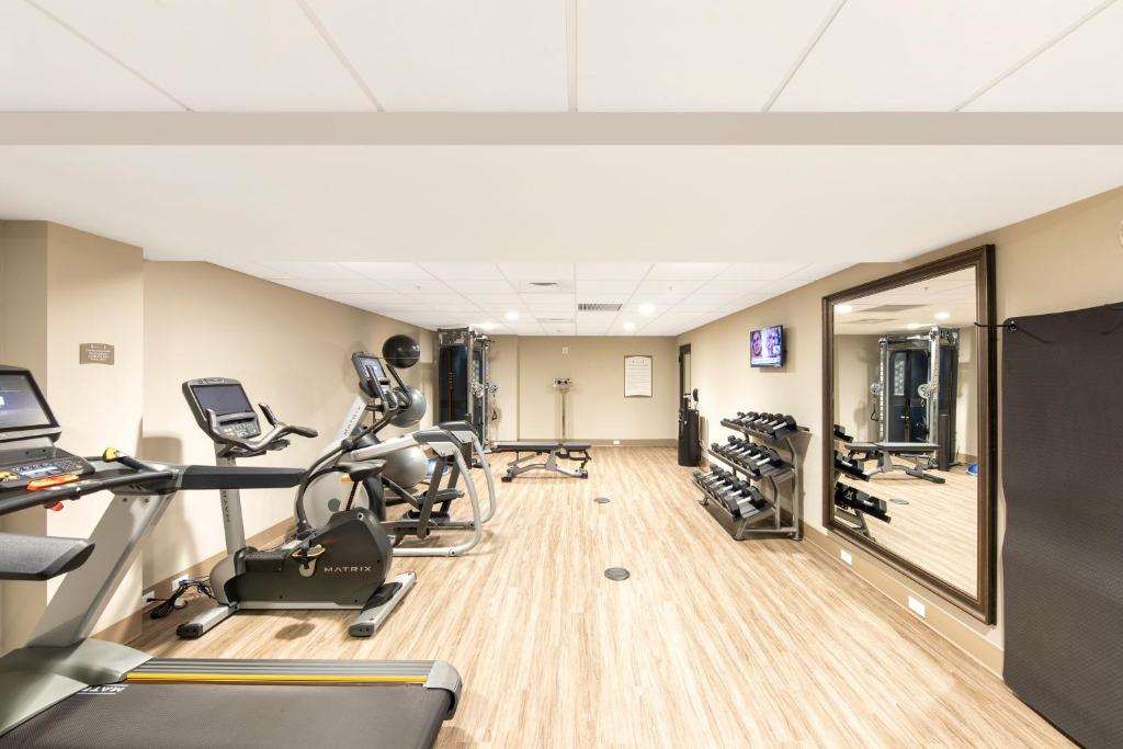 a gym with treadmills and elliptical machines at Staybridge Suites - Naples - Marco Island by IHG in Naples