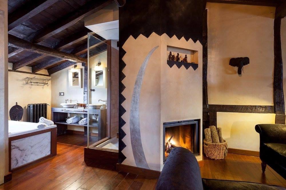 Postel nebo postele na pokoji v ubytování Hotel Boutique Valle de Oca