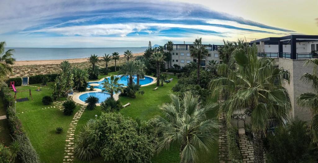 Bazén v ubytovaní Dorasal Solo Familias Serviplaya alebo v jeho blízkosti