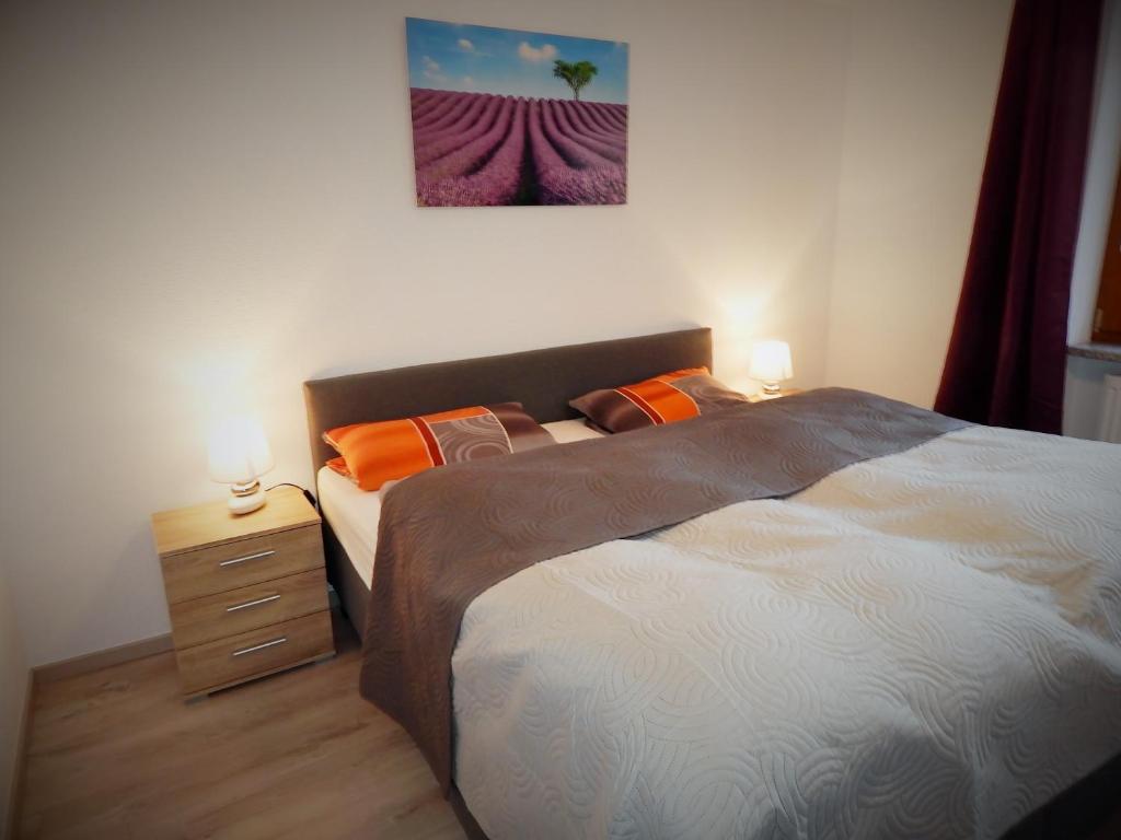 Postel nebo postele na pokoji v ubytování Ferienwohnung Vogl