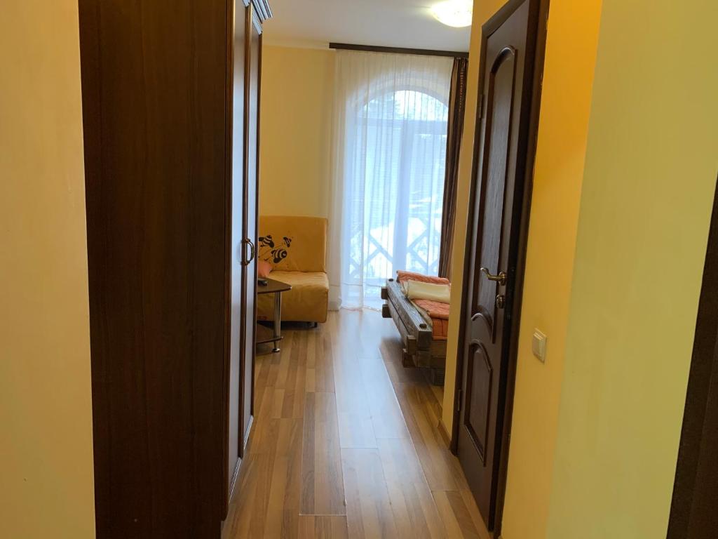 Postel nebo postele na pokoji v ubytování Hotel Kalyna