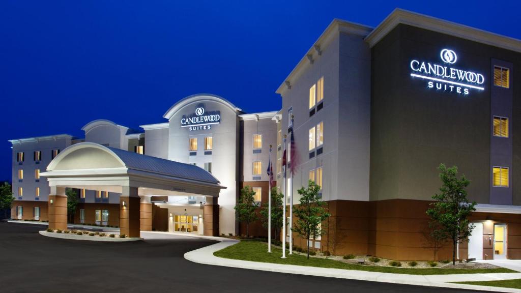 a rendering of the grandview hotel at night at Candlewood Suites Carrollton, an IHG Hotel in Carrollton