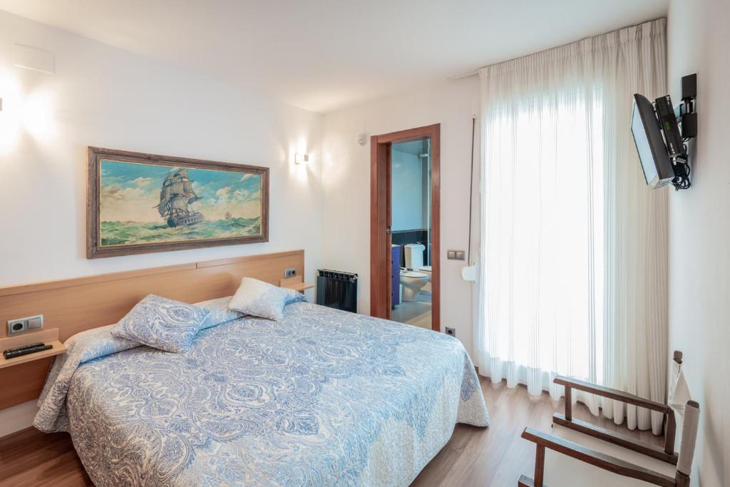 Posteľ alebo postele v izbe v ubytovaní InSitges Ribera's Beach