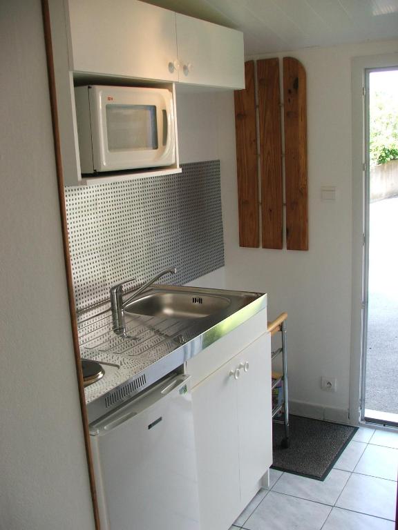 Kuchyň nebo kuchyňský kout v ubytování Chambres d'hotes Welcome Trépied
