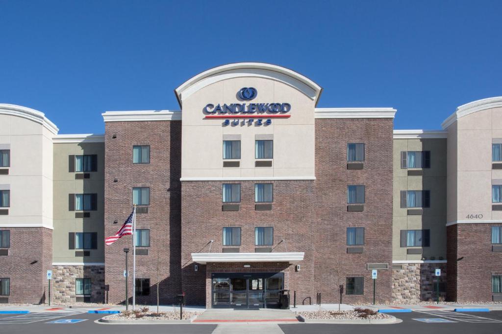 a rendering of the entrance to a hotel at Candlewood Suites Pueblo, an IHG Hotel in Pueblo