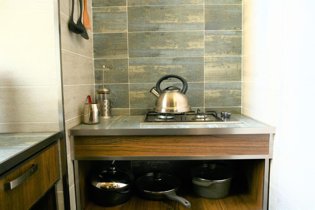 Kuchyň nebo kuchyňský kout v ubytování Aparthotel Mari