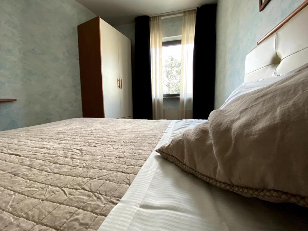 Postel nebo postele na pokoji v ubytování Sole della Franciacorta - Hotel & Restaurant