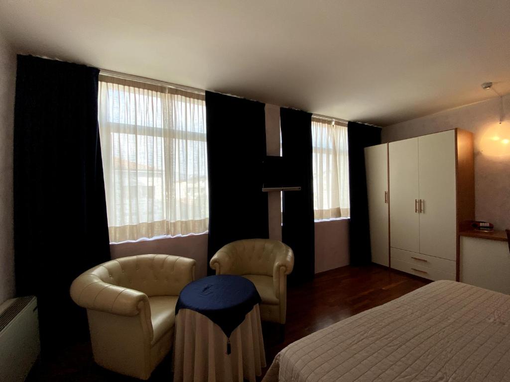Postel nebo postele na pokoji v ubytování Sole della Franciacorta - Hotel & Restaurant