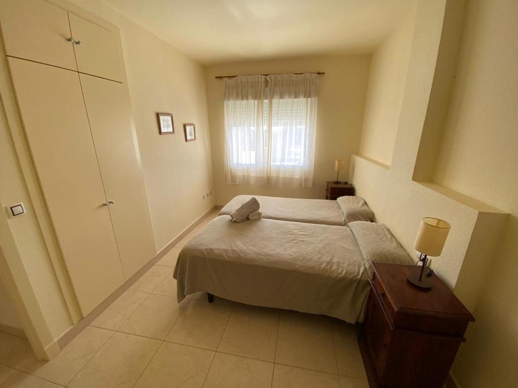 Postel nebo postele na pokoji v ubytování Apartamento en Bahia Golf - Costa Ballena