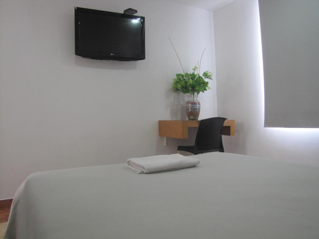 TV a/nebo společenská místnost v ubytování Hotel Mar del Plata