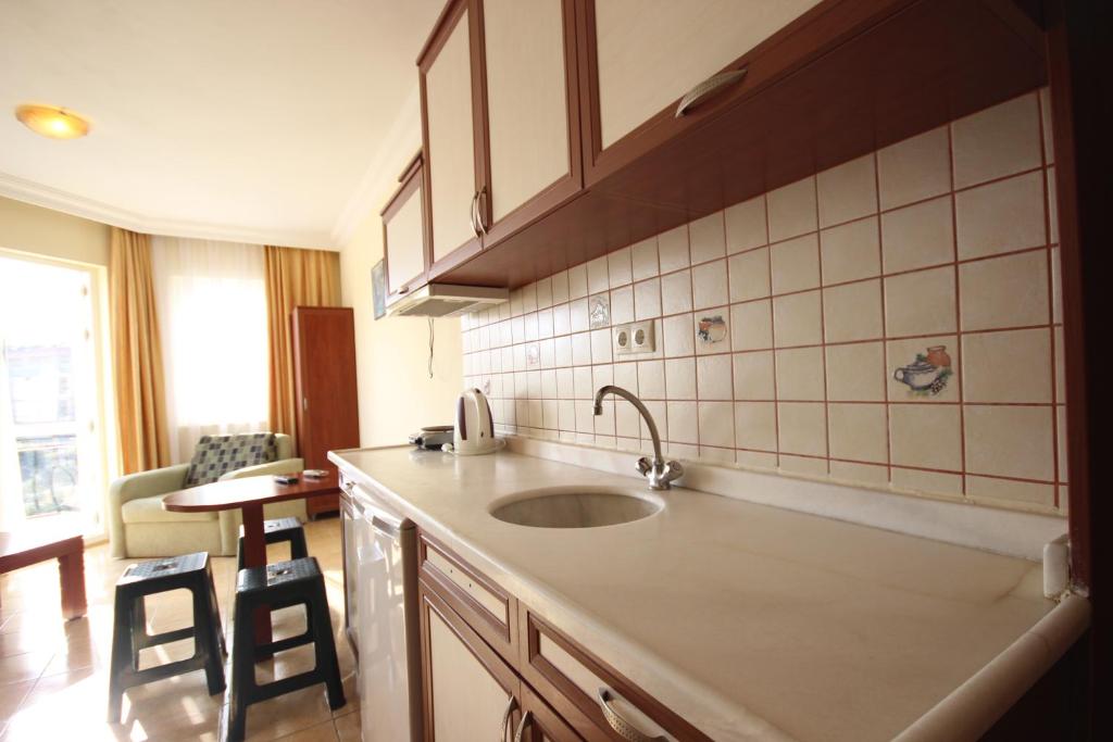 Küche/Küchenzeile in der Unterkunft Minta Apart Hotel