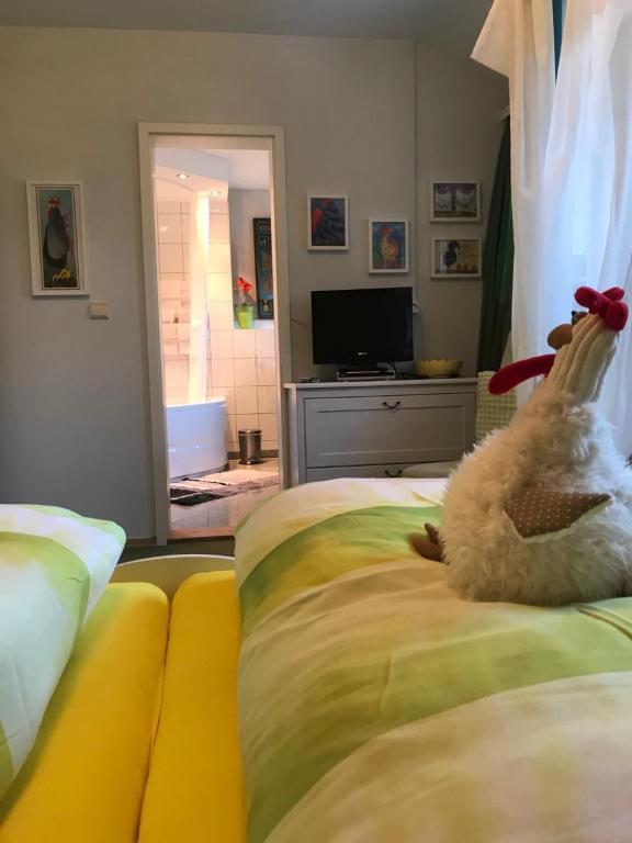 Postel nebo postele na pokoji v ubytování Waldhotel Auerhahn "Hochkopfhaus"
