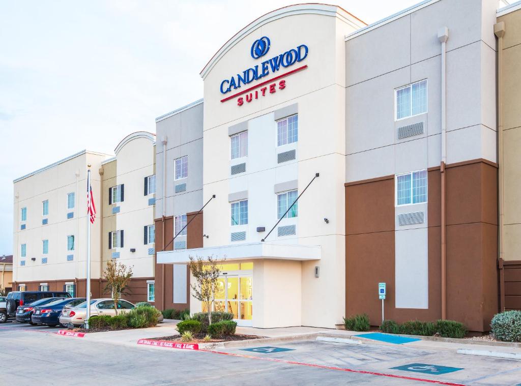 a rendering of a cranbrook hotel with cars parked in a parking lot at Candlewood Suites Georgetown, an IHG Hotel in Georgetown