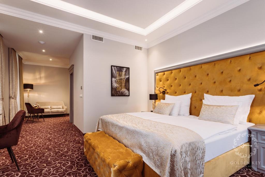 Voodi või voodid majutusasutuse Golden Key Boutique Hotel toas