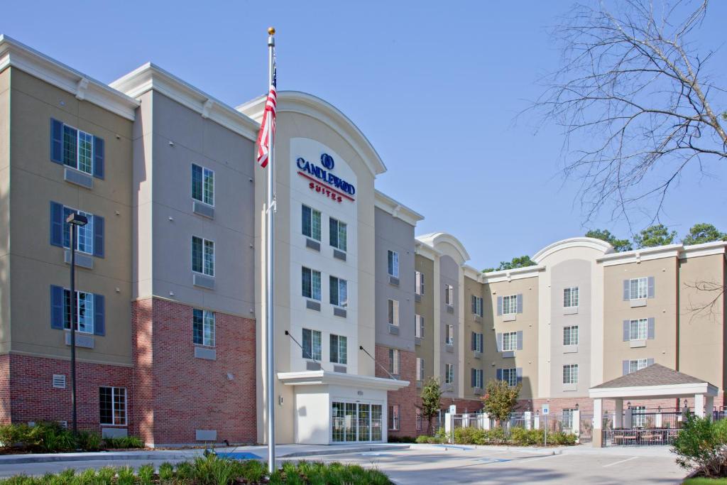 an exterior view of the hampton inn and suites at Candlewood Suites Houston The Woodlands, an IHG Hotel in The Woodlands