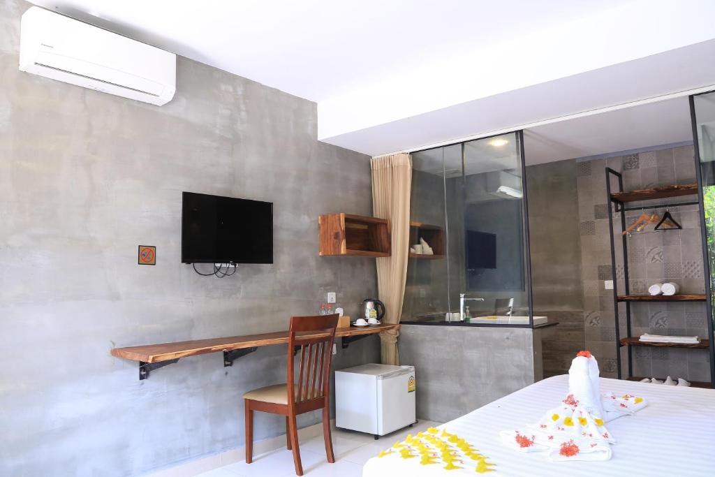 TV a/nebo společenská místnost v ubytování BK Hotel