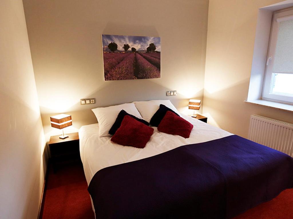 Postel nebo postele na pokoji v ubytování Hotel Otoliński