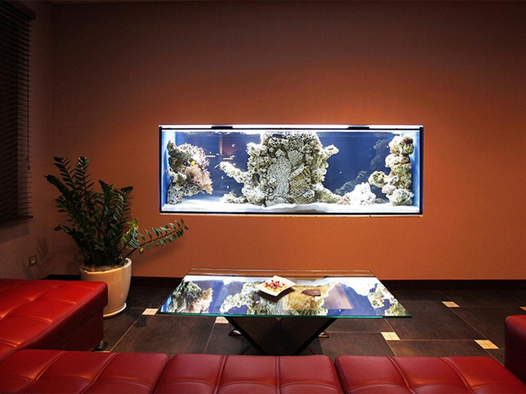 TV a/nebo společenská místnost v ubytování Hotel Otoliński