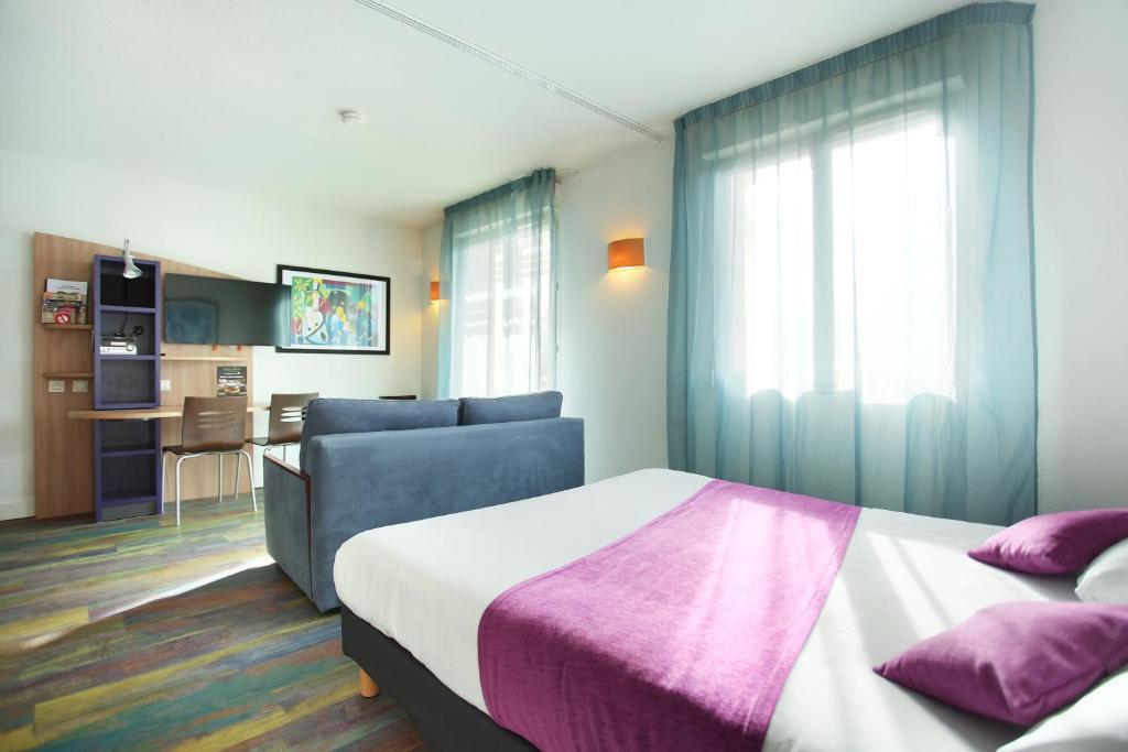Postel nebo postele na pokoji v ubytování Suite-Home Orléans-Saran
