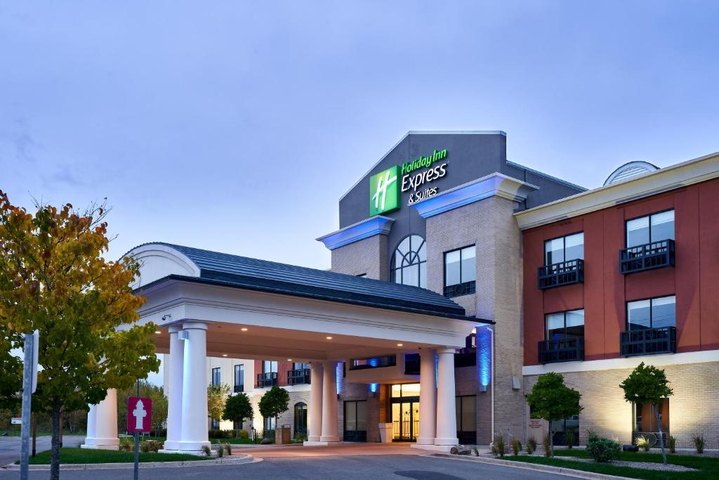 a hotel with a sign on the front of it at Holiday Inn Express Hotel & Suites Dieppe Airport by IHG in Moncton