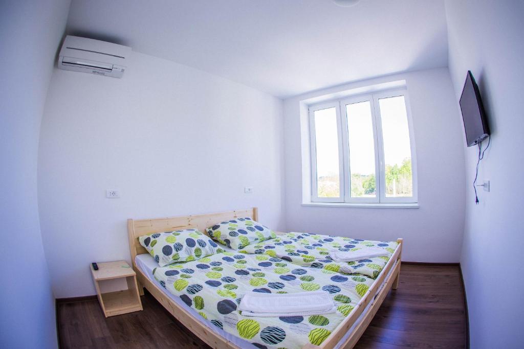 Postel nebo postele na pokoji v ubytování Life Hostel Slovenia