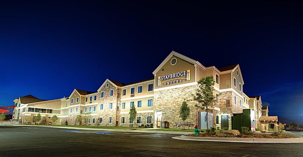 a rendering of a hotel at night at Staybridge Suites Salt Lake-West Valley City, an IHG Hotel in West Valley City