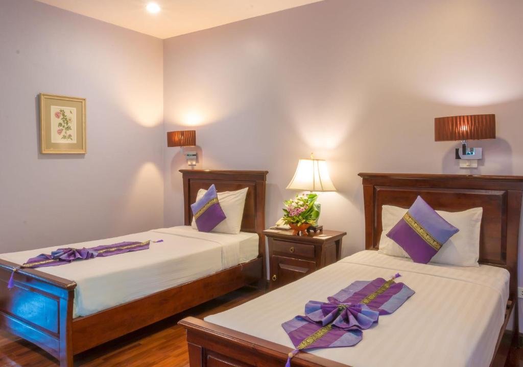 Cama o camas de una habitación en Phuwanalee Resort