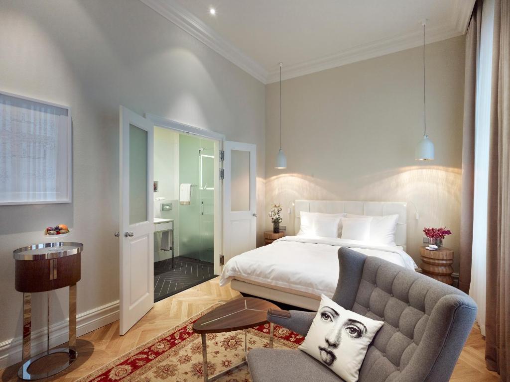 Postel nebo postele na pokoji v ubytování Hotel Sans Souci Wien