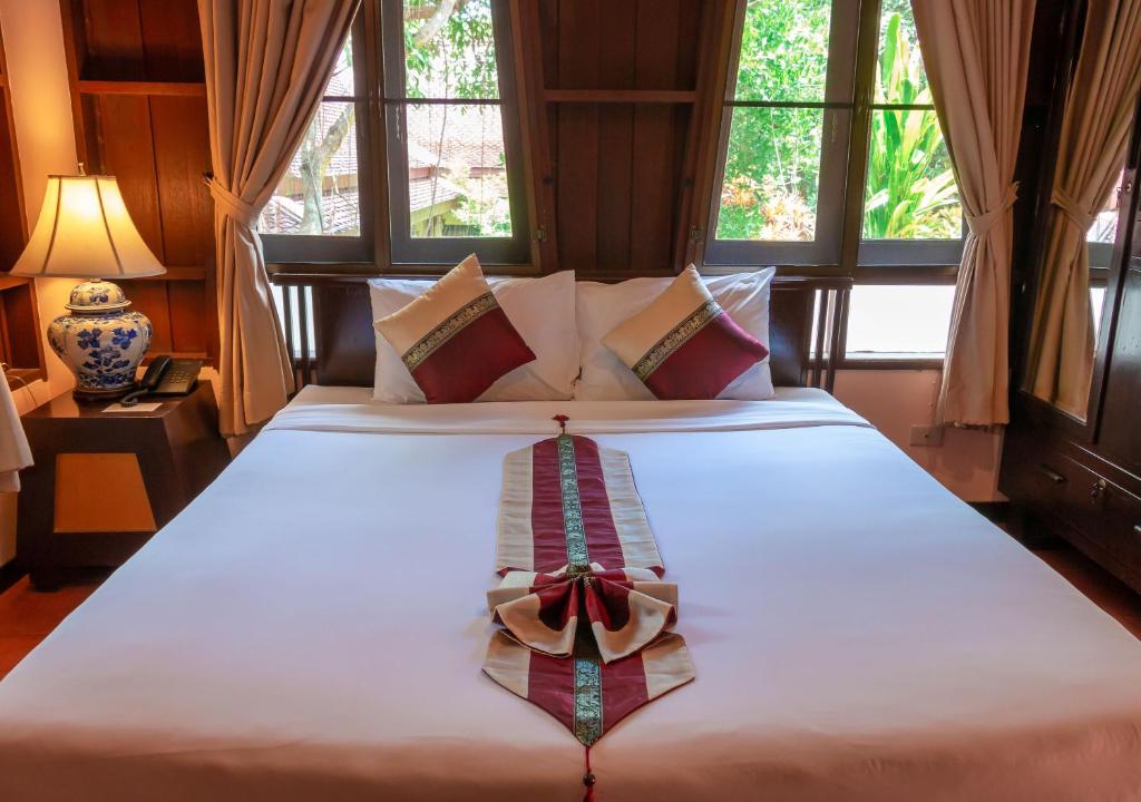 Cama o camas de una habitación en Phuwanalee Resort