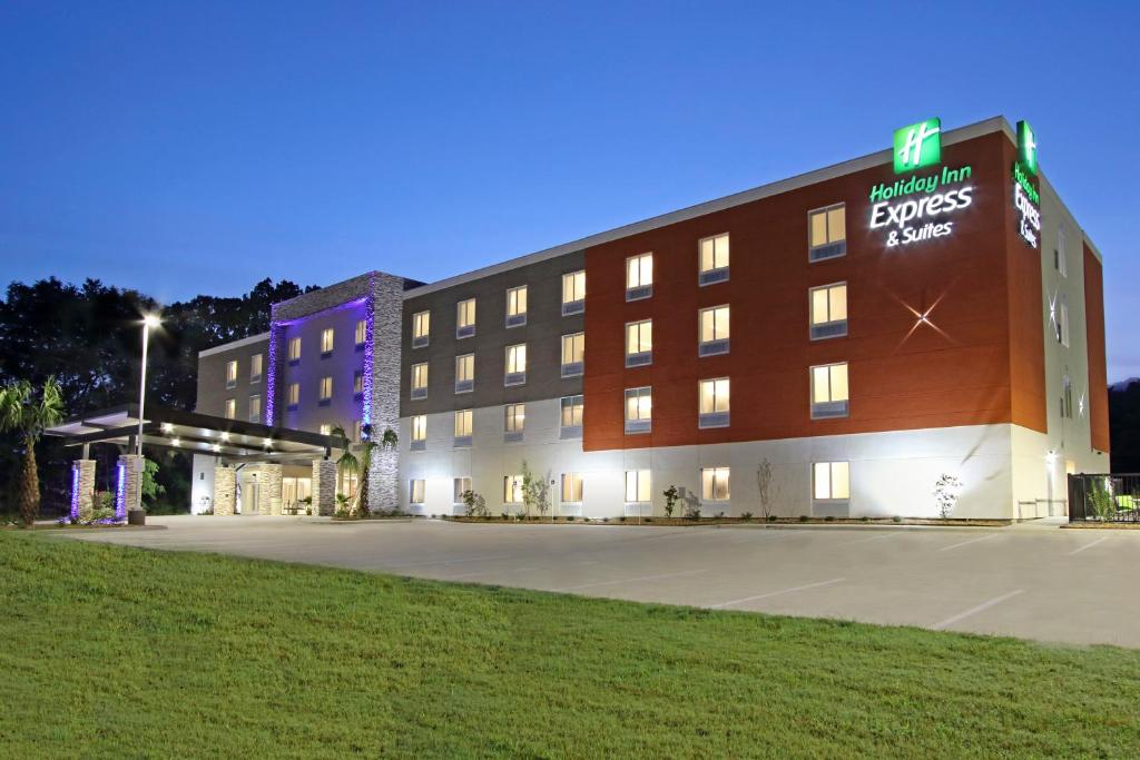 a hotel with a sign on the front of it at Holiday Inn Express & Suites Columbus North, an IHG Hotel in Columbus