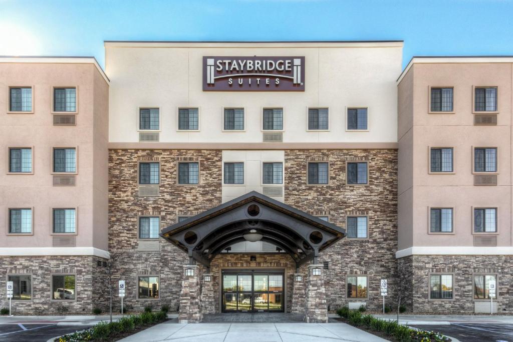 a rendering of the entrance to the starbuck hotel at Staybridge Suites St Louis - Westport, an IHG hotel in Maryland Heights