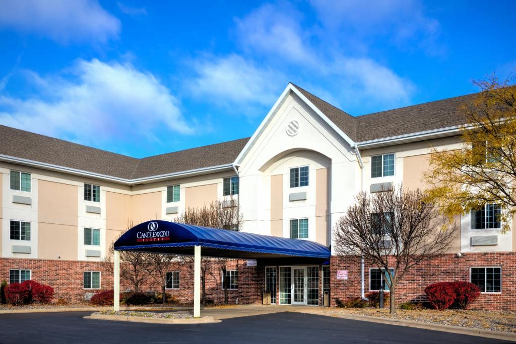 a rendering of the front of a hotel with a blue awning at Candlewood Suites Appleton, an IHG Hotel in Appleton