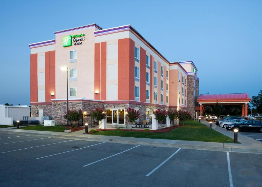 a hotel with a parking lot in front of it at Holiday Inn Express Tulsa South Bixby, an IHG Hotel in Tulsa