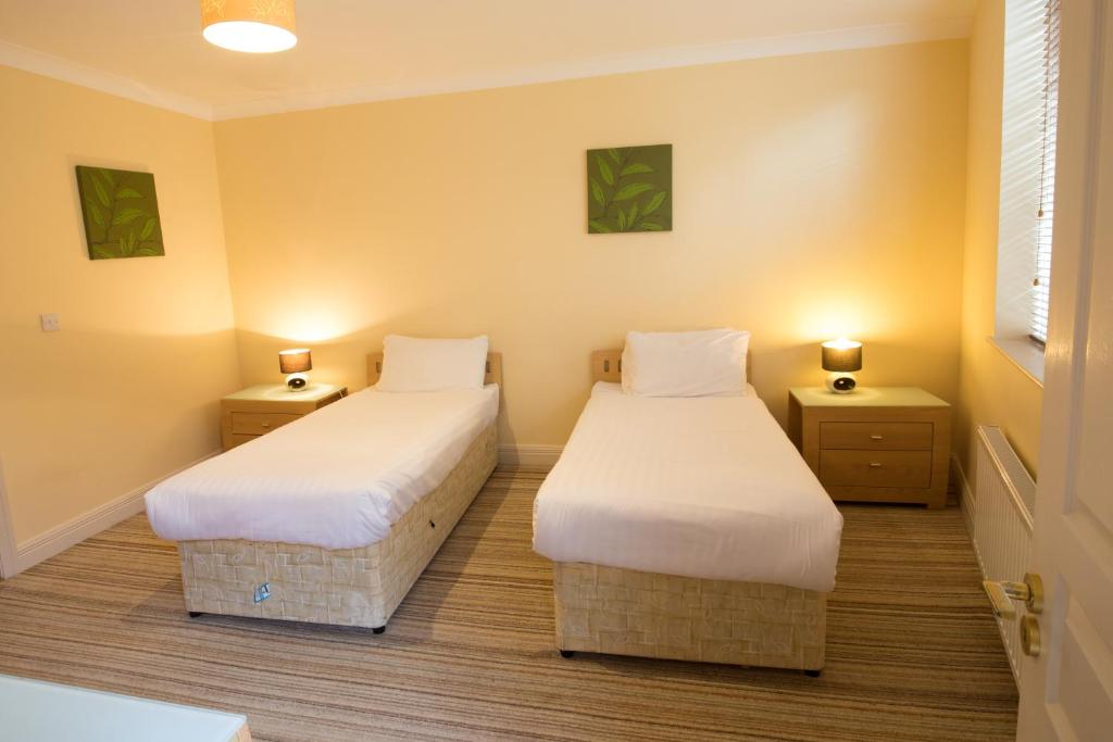 Postel nebo postele na pokoji v ubytování Ocean Sands Hotel