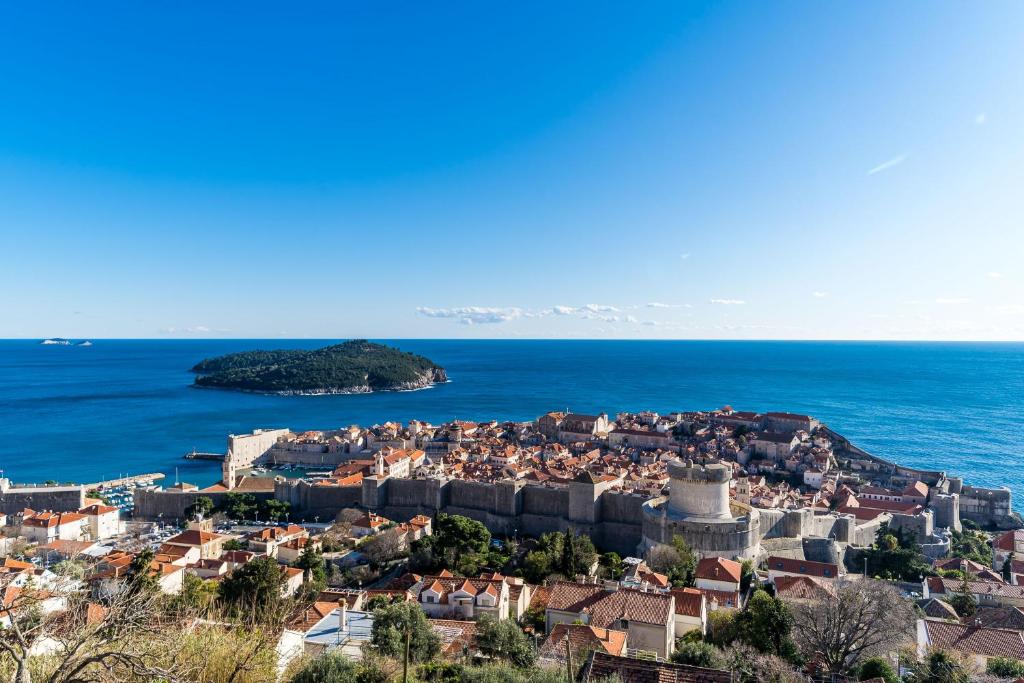 an aerial view of a town on the ocean at The View in Dubrovnik