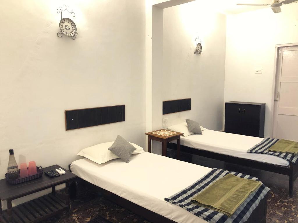 Postel nebo postele na pokoji v ubytování Hotel Paulino