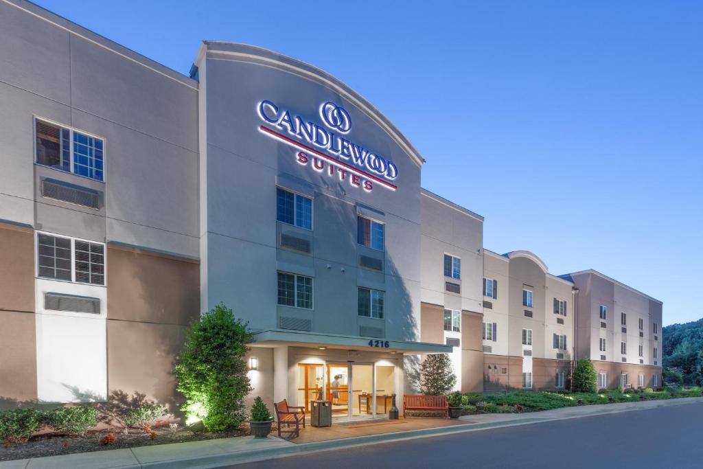 a rendering of the front of a campus building at Candlewood Suites Aberdeen-Bel Air, an IHG Hotel in Riverside