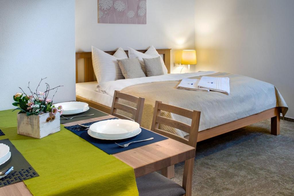 Postel nebo postele na pokoji v ubytování Apartmány Roháče